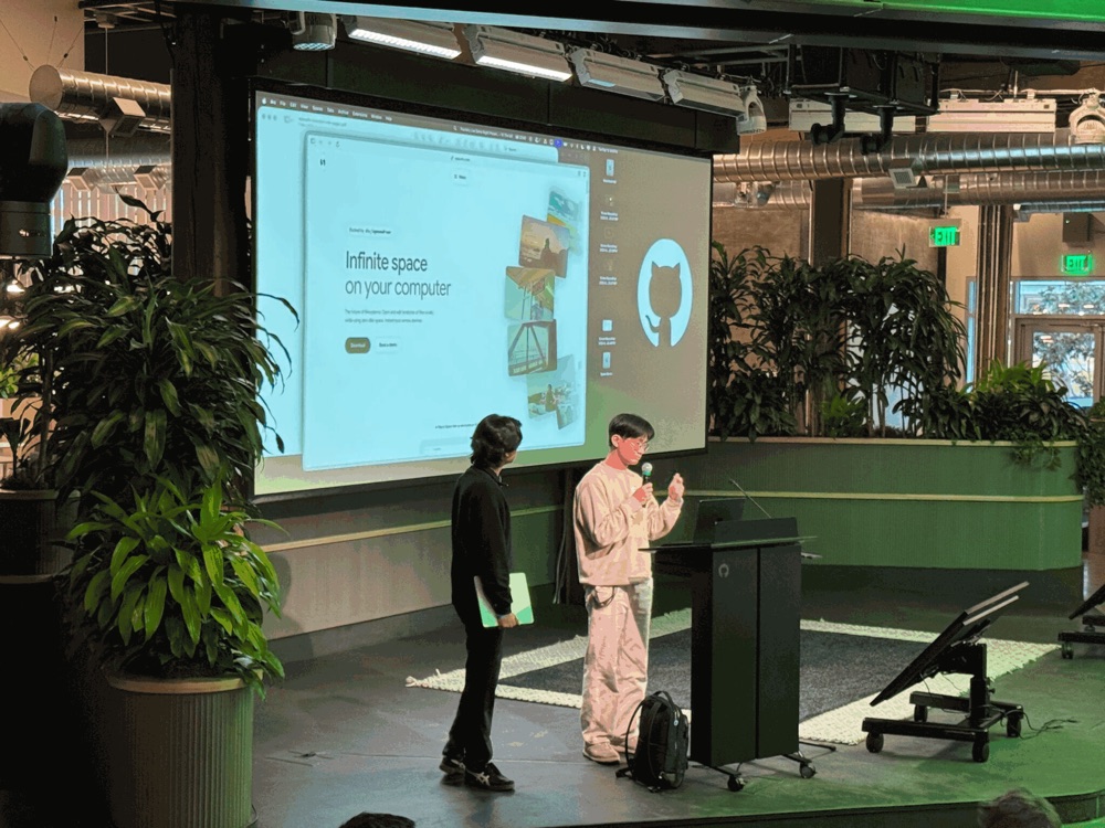 Two presenters demoing their project at Foundry Live Agentic AI Demo Night