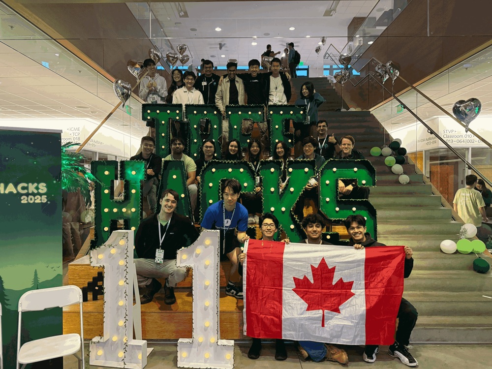 Group photo with the TreeHacks 2025 marquee letters at Stanford